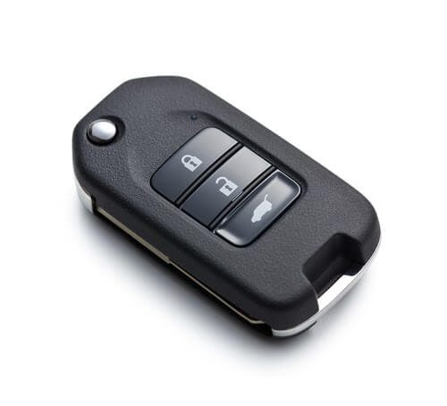 What is a transponder key and how does it work?